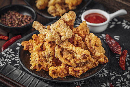 油炸食品特色美食油炸酥肉背景