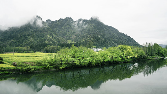 皖南齐云山下中国风山峦溪流背景图片