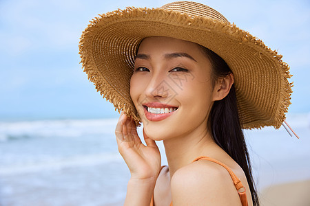 沙滩美女夏日海边旅行的清新美女背景