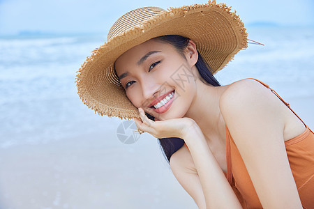 海边美女夏日海边旅行的清新美女背景