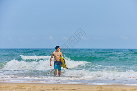 沙滩日落冲浪男孩背景