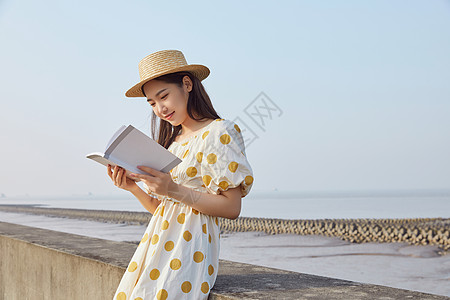 窗台看书少女在看书的悠闲女性背景