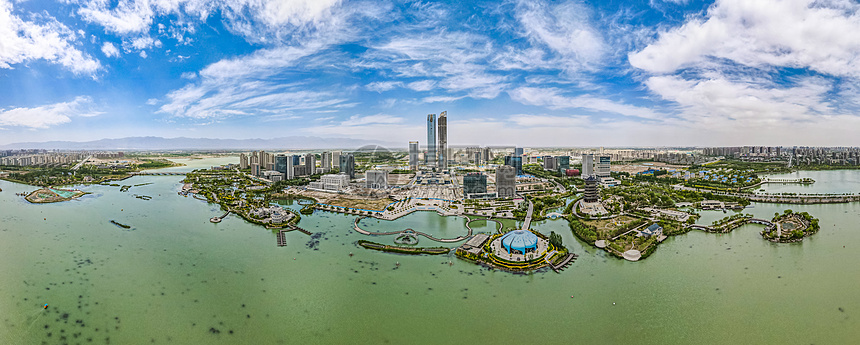 航拍蓝天白云下的宁夏银川阅海湾cbd金融中心图片