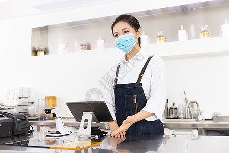 饮品店女服务员戴口罩服务高清图片