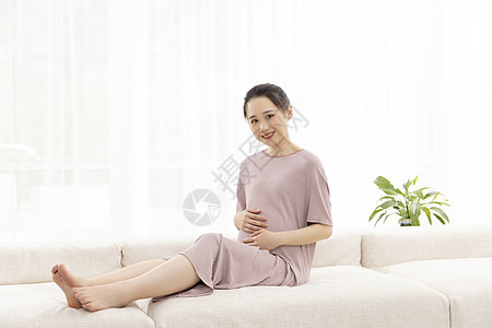 美女孕妇居家休闲生活图片