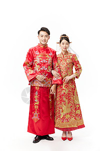 穿中式古装结婚礼服的新娘和新郎图片