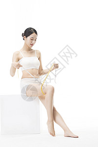 健康美体女性用卷尺量腿围图片