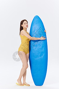 日系比基尼少女夏天元气美女手拿冲浪板背景