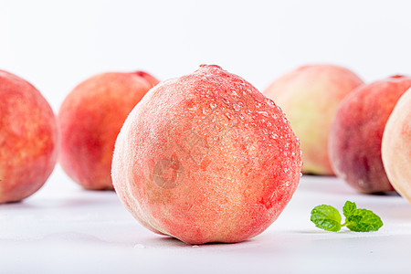 粉色夏季边框好吃美味的水蜜桃水果背景