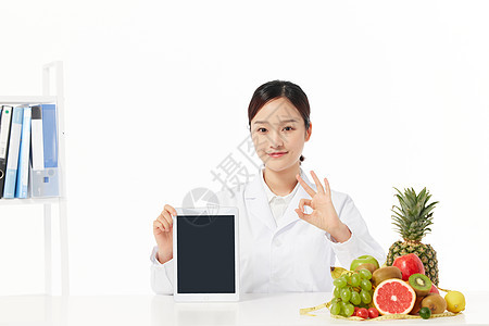 营养师展示平板电脑背景图片