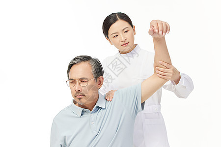 护士帮助老人做肢体复健图片