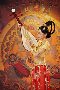 舞蹈海报手拿琵琶舞蹈的西域美女背景