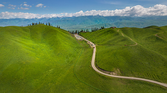 旅游户外航拍5A景区夏季绿色新疆那拉提大草原自然风光背景