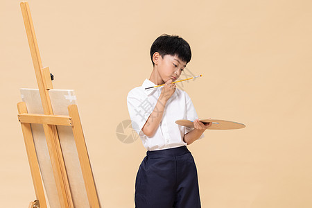 学习绘画遇到瓶颈的小男孩背景图片