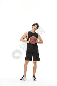 打篮球的男性形象背景图片