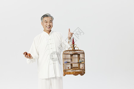 中老年男性手提鸟笼形象图片