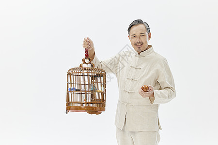 中老年男性手提鸟笼形象图片