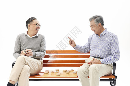 老年人长椅上下棋高清图片