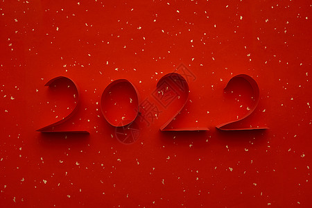 新年狂欢2022年红色撒金字背景