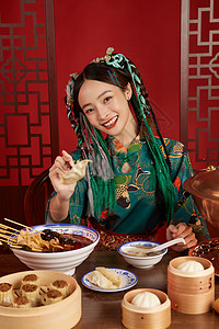 筷子夹饺子的国潮美女图片