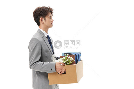 失业商务男性被开除抱着纸箱图片