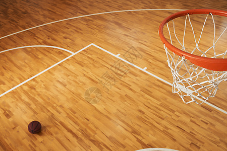 篮球场上的篮球框室内篮球场地板空间背景