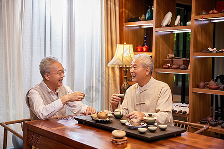 家人团聚老年好友聚会一起喝茶聊天背景