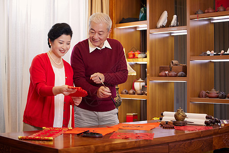 恩爱夫妻过年写毛笔字装饰房间背景图片