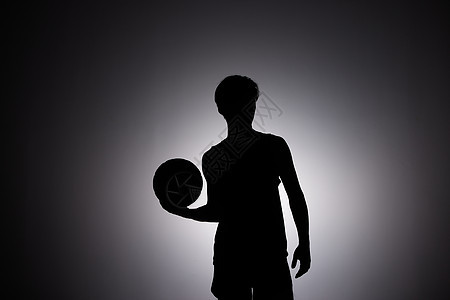 男性篮球运动员剪影形象背景图片