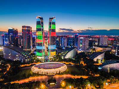 高层建筑夜景航拍成都新地标交子之环与金融城双子塔夜景背景