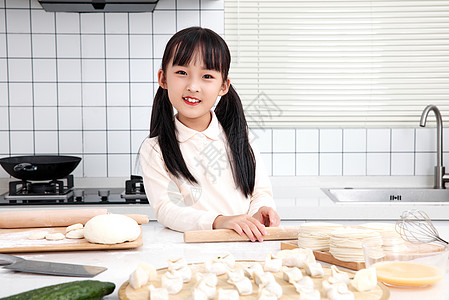 过节女孩学习包饺子背景