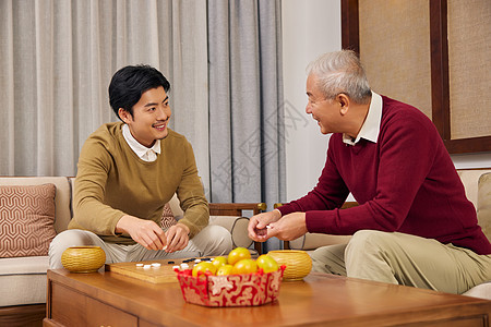 春节父子下围棋背景图片