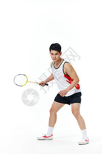 打羽毛球的男性运动员形象背景图片