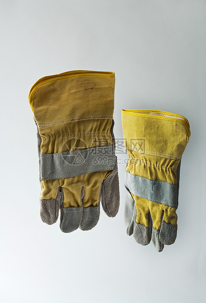 一对黄色防护手套图片