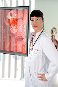 医生在屏幕上观察红血细胞的图像背景图片