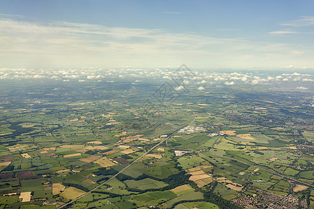田地和云层的空中观察曼彻斯特兰卡西雷英国格兰图片