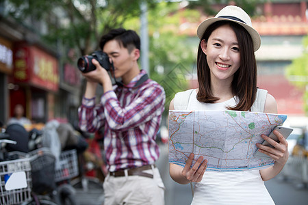 北京地图女人拿着地图旅行背景