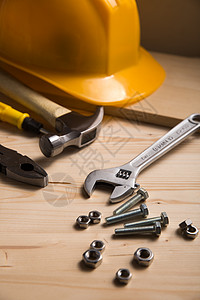 装修活动素材建筑业安全帽与工具背景