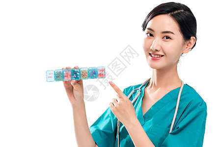 青年女医生拿着药盒图片
