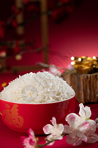 金色梅花红色大米品质传统特色米饭背景