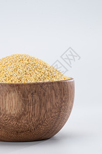 谷子小米种子饮食文化一碗小黄米背景