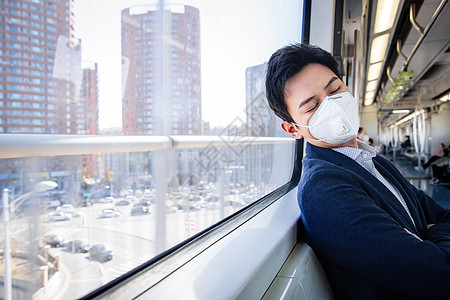 商务男子预防环境问题交通方式青年男子在地铁里睡觉背景