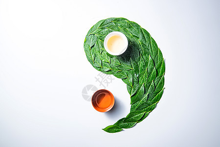 传统茶叶和茶杯组成的太极图案背景图片