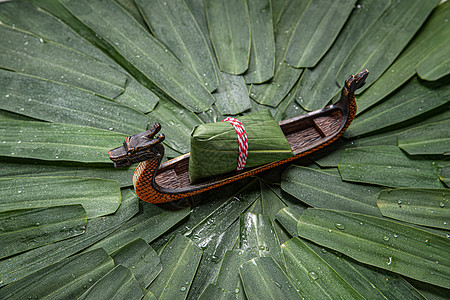 蜗牛png龙舟和粽子背景