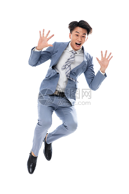 正装夸张动态动作兴奋跳跃的商务男士图片