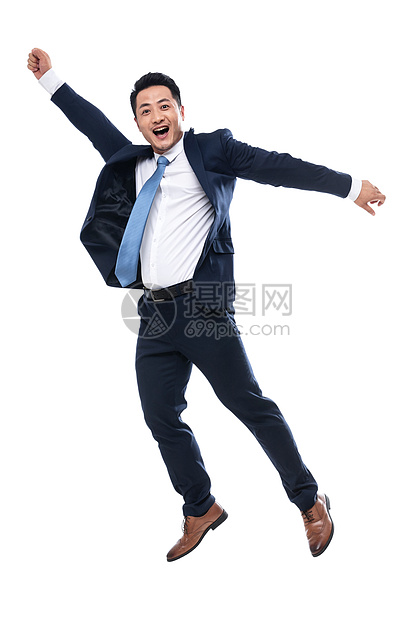 拳头夸张乐趣欢呼跳跃的商务男士图片