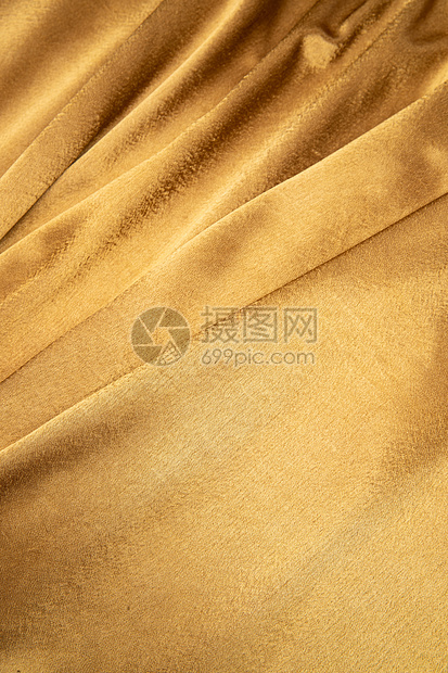 华贵布料垂直构图金色丝绸图片