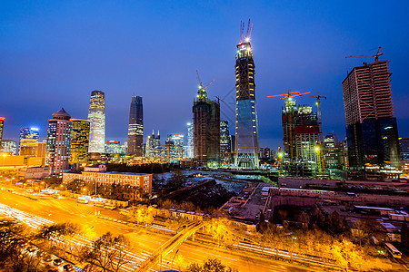 工地夜景城市CBD的摩天大楼景象背景