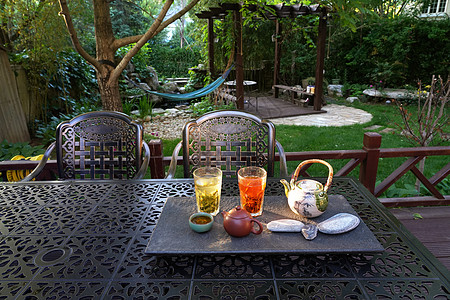 陶瓷茶壶庭院中喝茶背景