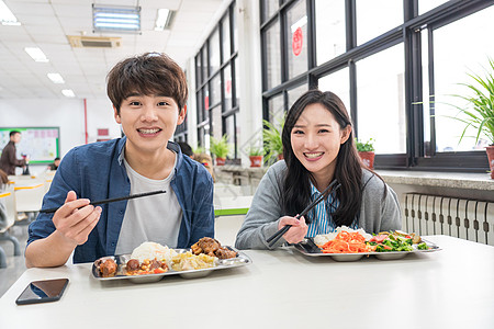 大学生在食堂里用餐高清图片